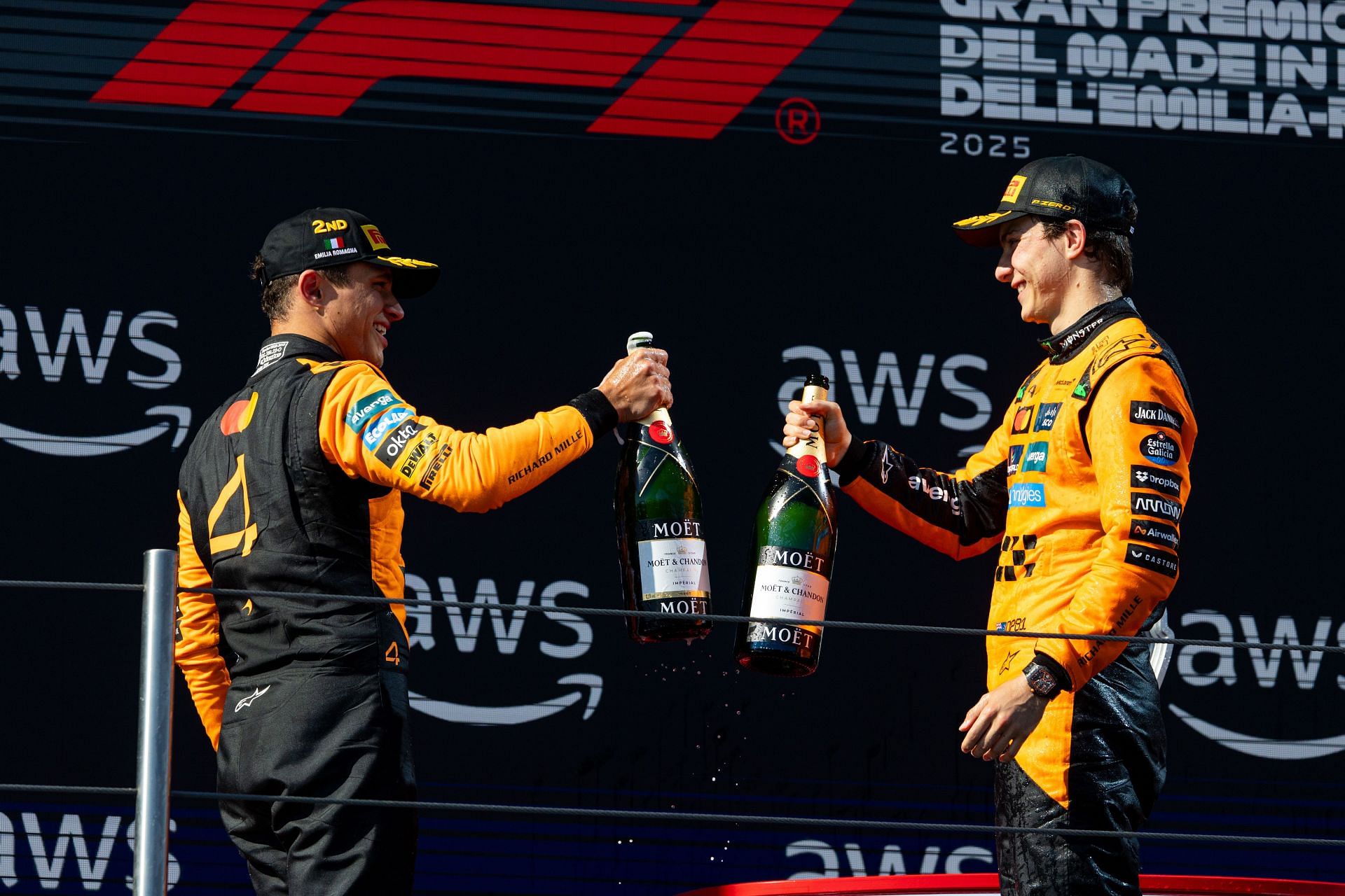 McLaren's Lando Norris and Oscar Piastri celebrate on the Emilia-Romagna podium. Source: Getty